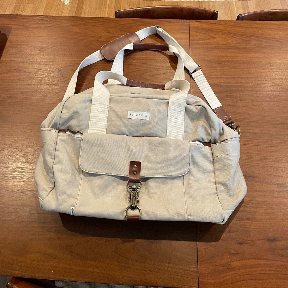 Cream Canvas Travel Bag with Minimalist Design